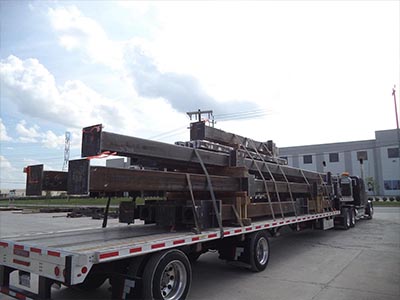 Long Metal Beams on Truck